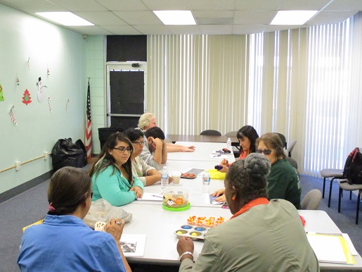 Everyone is busy trying to read the interesting Braille phrases that are used for this Braille club session.